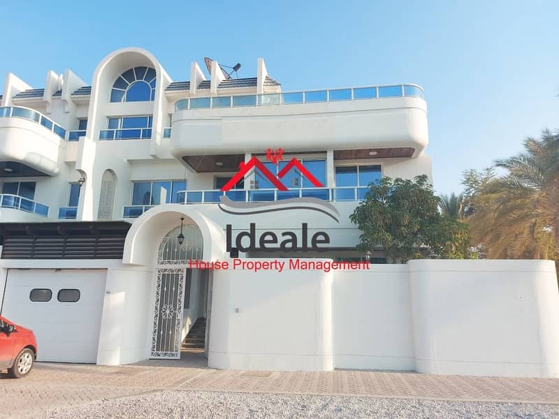 Immaculate 6BR villa with charming balcony and garden