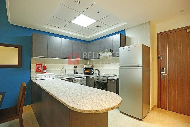 6 Fully Equipped Kitchen |Pool View | Middle Unit |1BR+Blcny