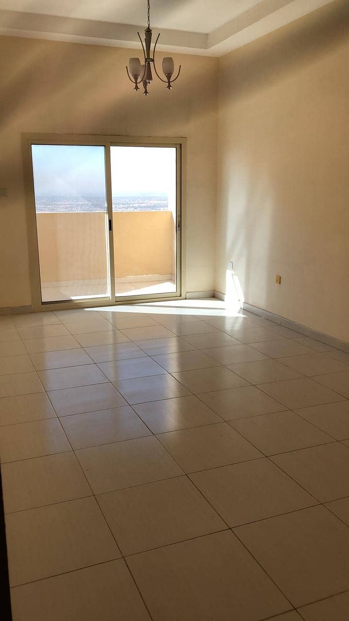 WITH PARKING WITH FEWA AVAILABLE FLAT FOR RENT 1 BED HALL 2 BATH IN LILIES TOWER HIGHER FLOOR FULLY EMIRATES ROAD VIEW APARTMENT IN JUST AED 16500