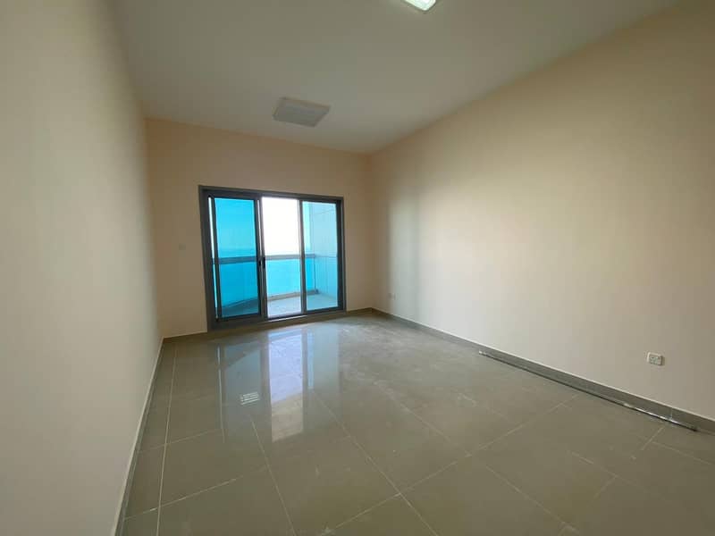 FULL SEA VIEW 2 BHK FOR RENT IN CORNICHE TOWER AJMAN WITH PARKING AND CHILLER FREE in 53000/-