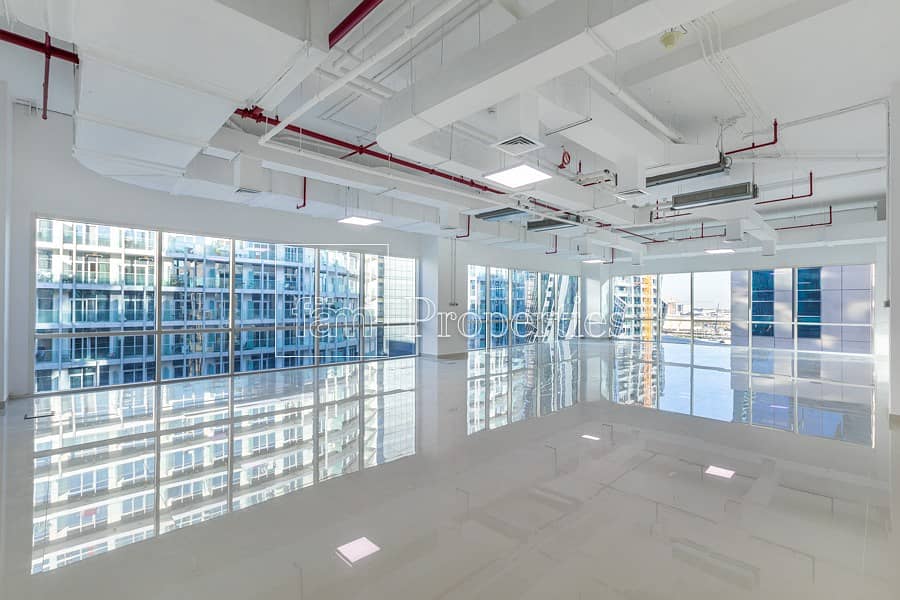 Fitted Corner Office with Floor to Ceiling WIndows