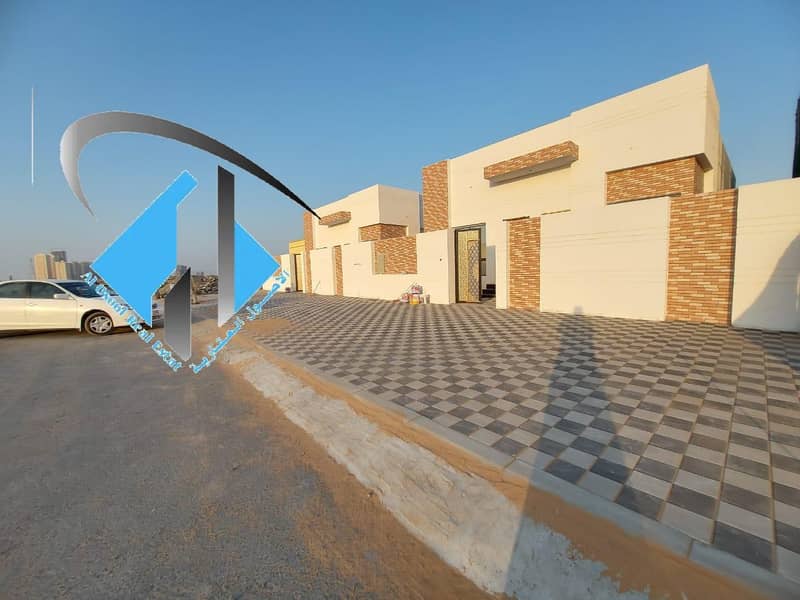 Villa for sale in Ajman, Jasmine area, ground floor on a street, with the possibility of bank financing