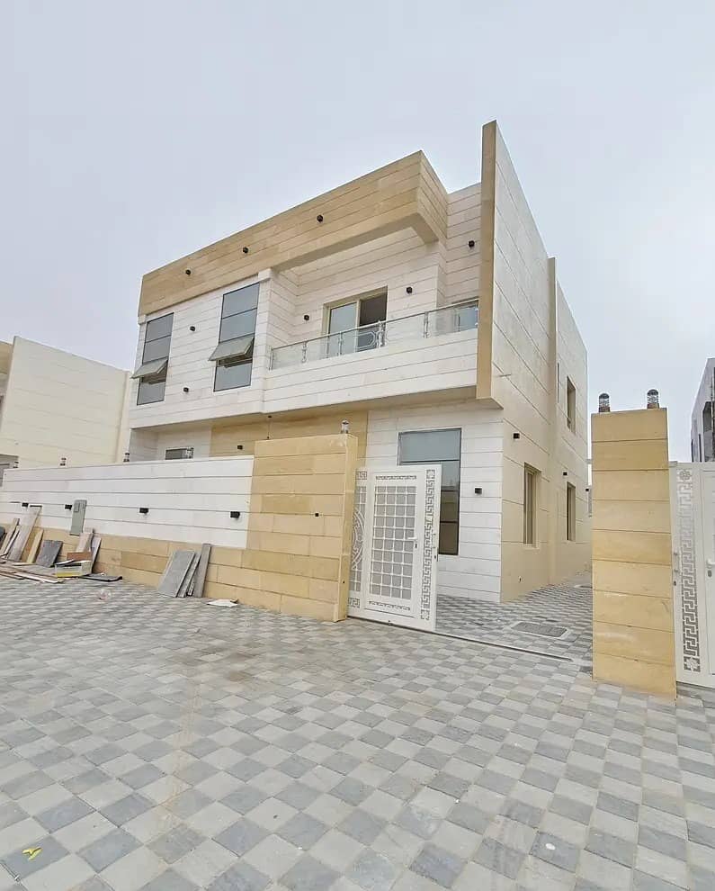 Negotiable price and without first payment, a masterpiece villa on the asphalt street, with a luxurious hotel design and super deluxe personal finishing, free ownership for life for all nationalities, less than a minute on Sheikh Mohammed Bin Zayed Road