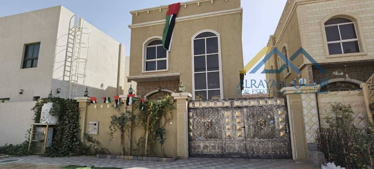 A new villa with water and electricity, a great location in Al Rawda 1, behind Al Hamidiyah Police Station, near the mosque