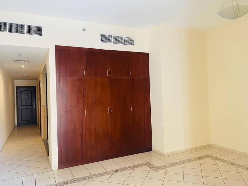 10 AED 30K plus 1 Month Free! Unfurnished  studio apartment w/balcony