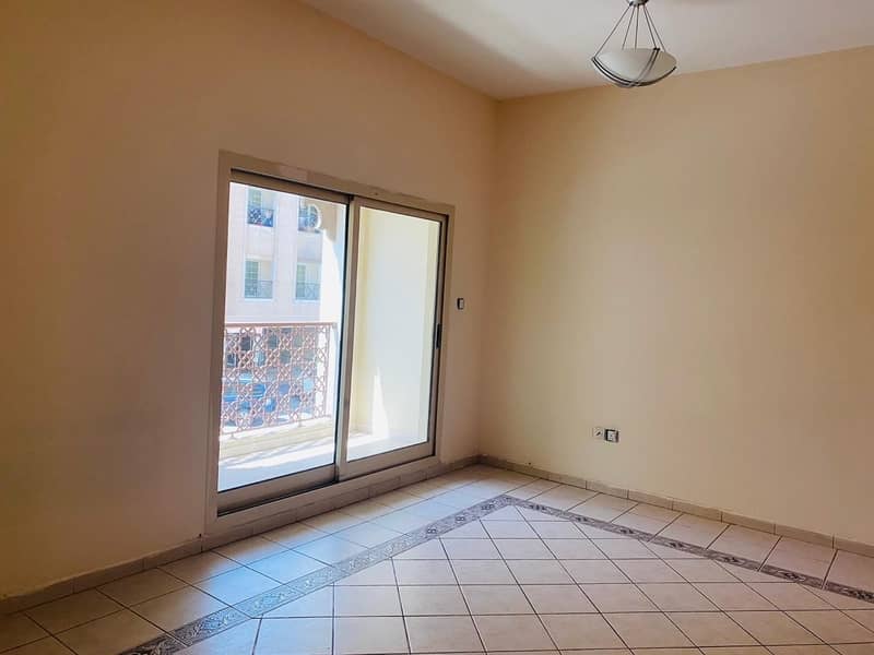 11 AED 30K plus 1 Month Free! Unfurnished  studio apartment w/balcony