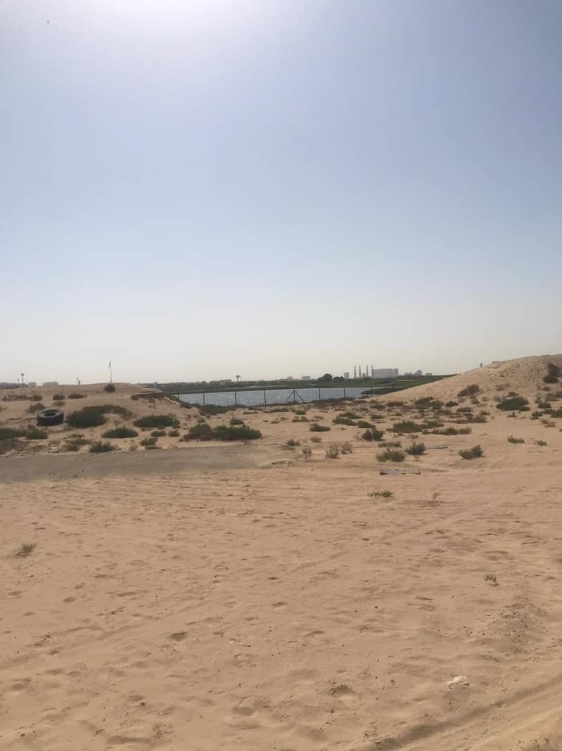 Residential lands for sale in Ajman, Al Zawra area, with golf courses, gardens and parks, with reasonable prices, with the possibility of installments