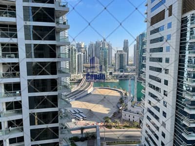 Stunning 2BR Apartment with Marina View Stunning 2BR Apartment with Marina View