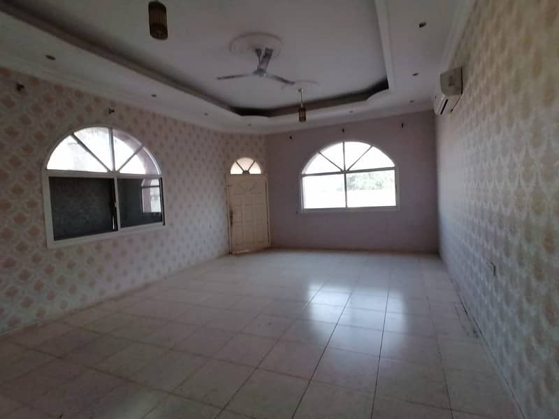 One floor villa for rent in Ajman, Al Rawda, 5 rooms, a majlis, a hall, and an extension, for only 75 thousand dirhams