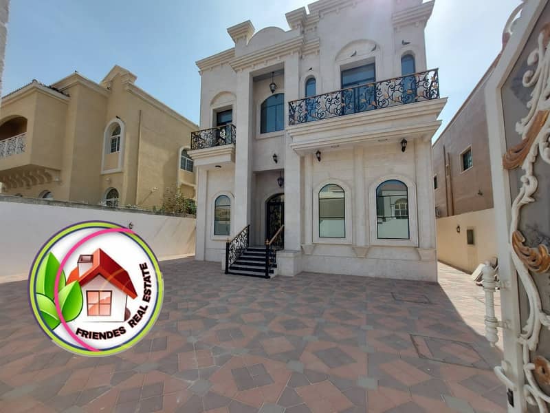 Luxurious, central adaptive villa with European design for sale in Ajman, next to all services from the owner, directly with bank financing at the lowest bank percentage, second piece from the neighboring street