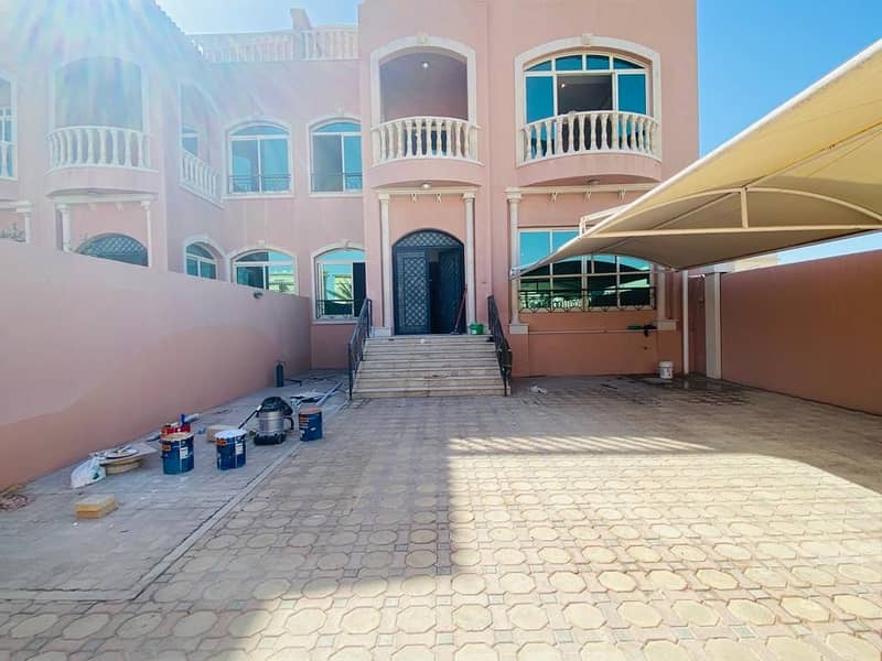 Super deluxe huge 5BR villa with back garden in khalifa city A