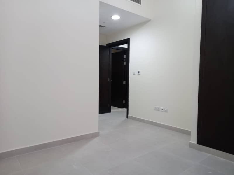 Booking your flat in new building with cars parking in el falah street abu dhabi