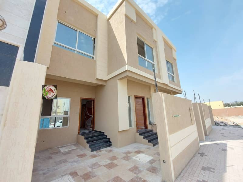 For sale, a villa in Ajman, facing a stone, on a running street, at a price of a shot without an initial payment, and in monthly installments for a period of 25 years, with a large bank indulgence