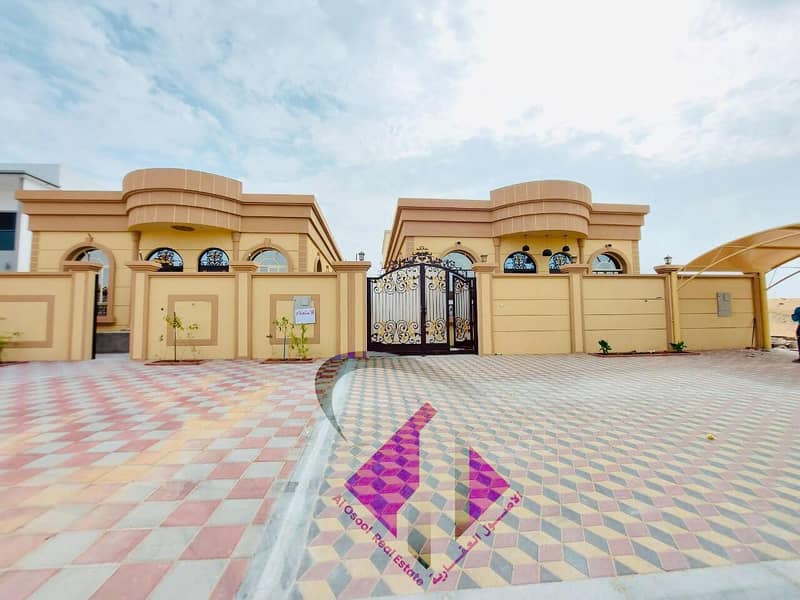 For sale a villa in Ajman on a running street at a price of a shot without an initial payment and in monthly installments for a period of 25 years with a large bank indulgence
