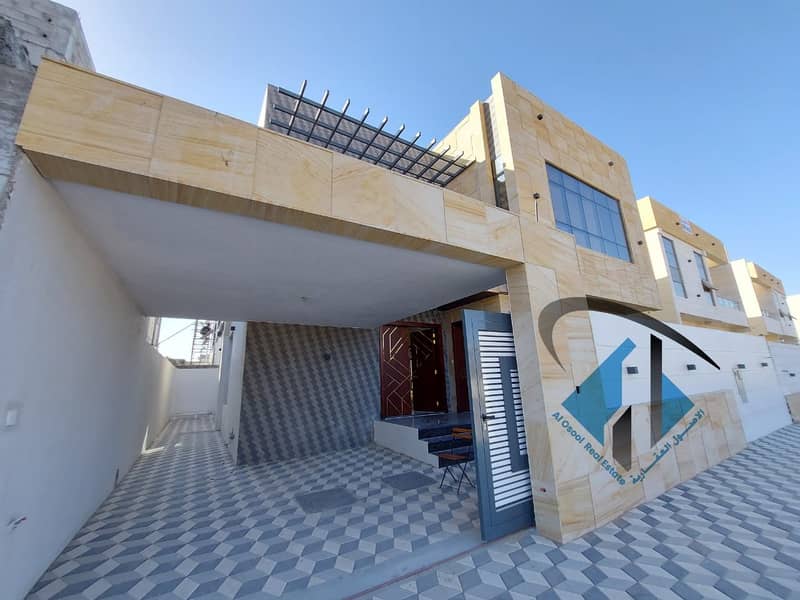 Excellent Modern villa with 5 bedrooms on the main road in Al yasmeen area .