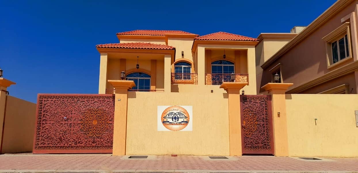 For sale a villa in Al Mowaihat 2, Emirate of Ajman, the first 6-room resident, with a monthly installment of 6000 dirhams