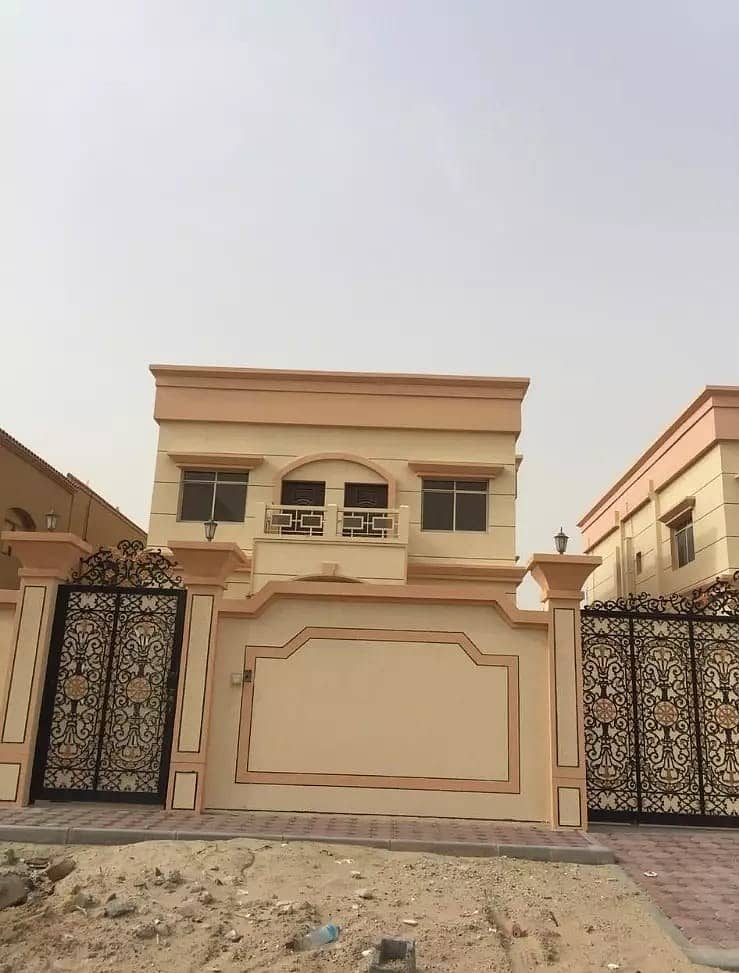 At a shot price for purchase, for sale, a new villa, the first resident in the Rawda area, with a modern Arabic design and more than wonderful finishing near Sheikh Ammar Street and close to all services in Ajman with the possibility of bank financing