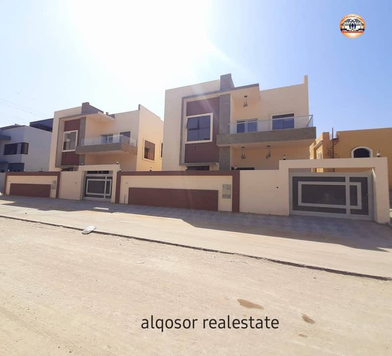 Villa for sale in Ajman, Jasmine area, two floors, designing various finishes on a direct street, with the possibility of easy bank financing
