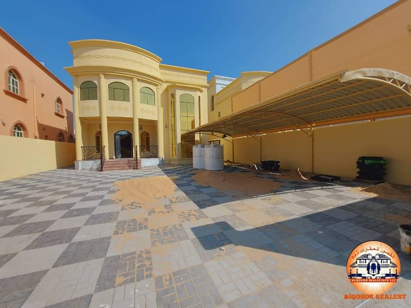 Arabic design and personal finishing villa for sale in Ajman, with a monthly installment starting from 5000 dirhams, with easy bank financing