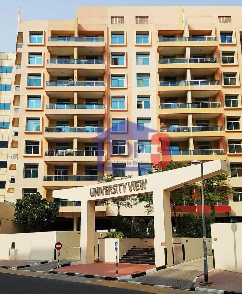 Unfurnished One Bedroom With Balcony  In University View  . Silicon Oasis .