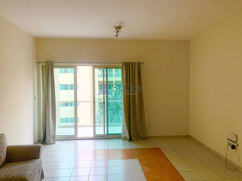 Chiller Free 1BR Apartment | With Balcony and Free Parking | The Greens