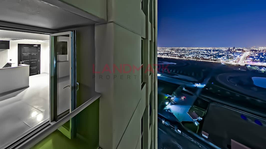 8 1BR on high floor | Lake and Burj Khalifa View | Balcony | Parking | Pool | Gym