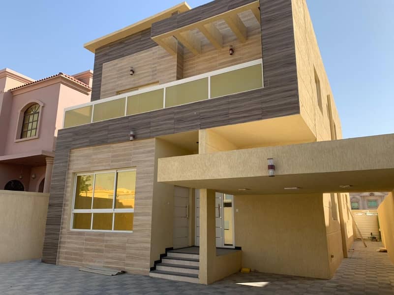 Villa for rent in the most prestigious areas of Ajman, very close to the street, Super Deluxe European designs