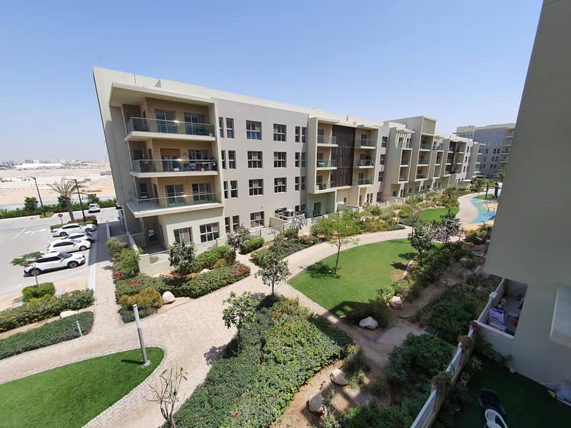 1bhk with balcony, wardrobes, pool parking facing park in Al Zahia comunity.