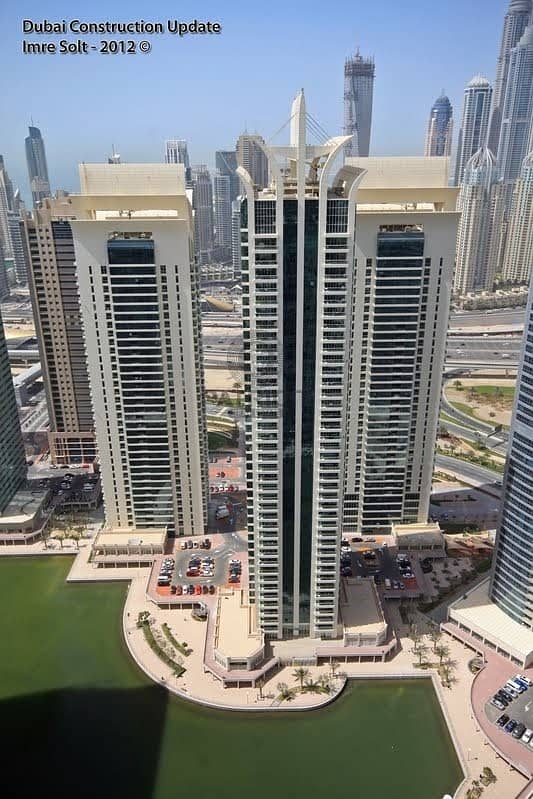 14 breath taking Golf facing one of the best layout 2 bedroom Tamweel tower