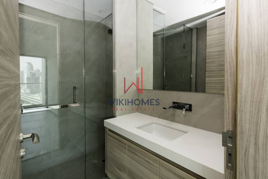 7 Panoramic Burj View | Brand New Building | 5 minutes to DT area | 6 cheques