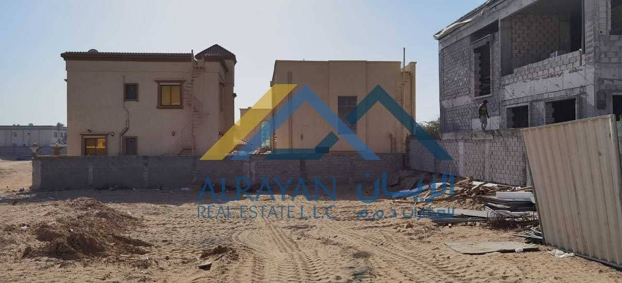 Residential land for sale in Al Mowaihat 1 near the new camel race track and Nesto