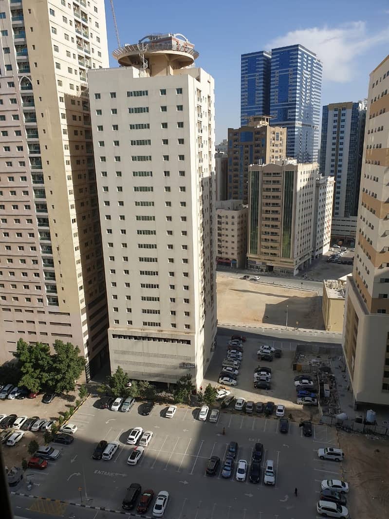 Flat for sale in  - Sharjah Nahda - 1200 feet - two rooms + hall + car parking -  325 thousand dirhams required - suitable for housing or investment