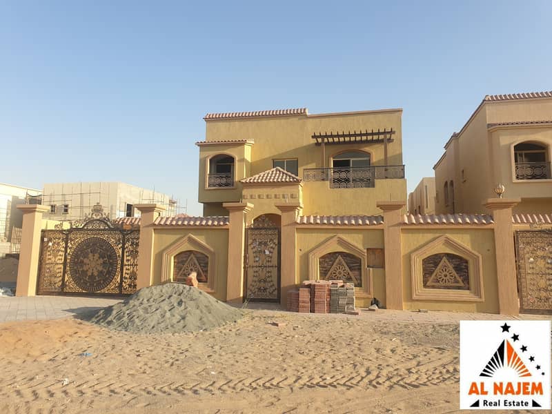 Sale: A new villa with a luxurious architectural heritage design in Al Mowaihat 1 areaWithout preliminary batch in Ajman, with the possibility of bank financing, cash or housing