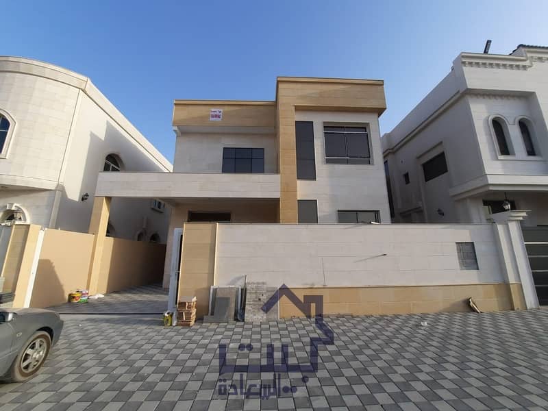 Villa for sale in Ajman, Jasmine area, two floors, Arabic design, various finishes, directly next to a mosque, with the possibility of bank financing