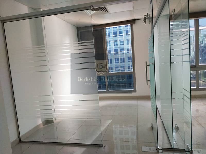 Fitted Office with Glass Partitions on Mid Floor