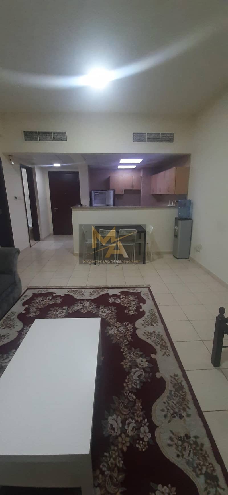 شقة في الحي البريطاني المدينة العالمية 1 غرف 3300 درهم 5114144