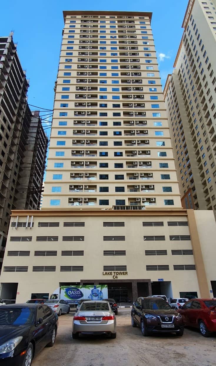 Invest while price is low! 1 Bedroom Hall w/ parking and FEWA paid in Lake Tower C4 Emirates City