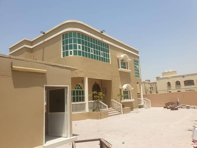 عVilla for rent in Ajman, Al Mowaihat 3 area, the villa area is 7000 square feet, at a good price and is negotiable