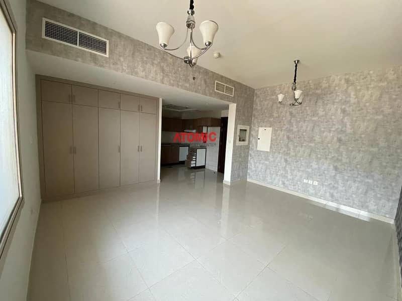 7 Amazing offer large studio with balcony pool view in Warsan4