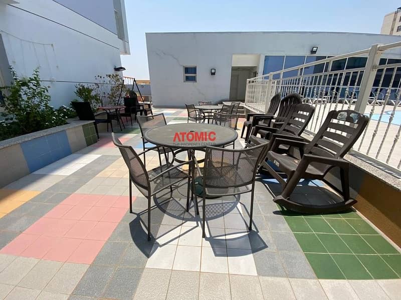 12 Amazing offer large studio with balcony pool view in Warsan4