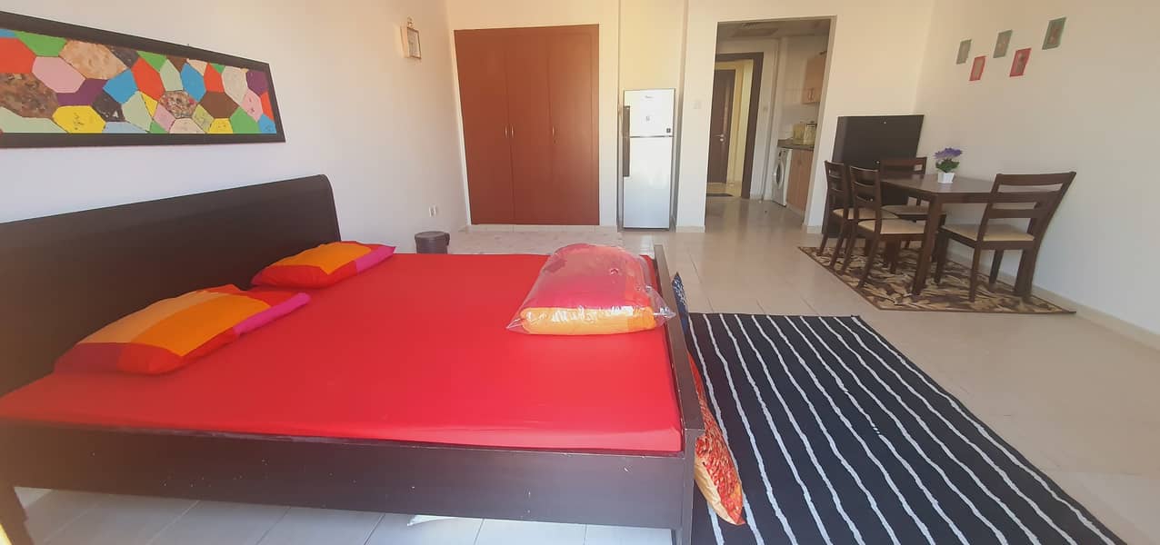 FULLY FURNISHED STUDIO FOR RENT IN SPAIN CLUSTER WITH HINGING BALCONY 24,000 BY 12