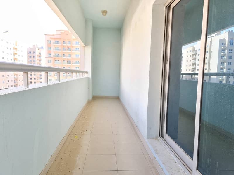 DXB GRAND OFFER,2 MONTHS FREE, 12 CHEQUES PAYMENTS, 2 B/R HUGE HALL, SEE VIEW ,FULL SUN LIGH KITCHEN, BIG BALCONY, WARDROBE, PARKING,MAINTENANCE FREE, RTA BUS STOP FRONT OF BUILDING