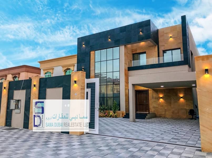 modern villa with a stone face with double glass, European designs, personal finishing, free ownership, a very privileged location,