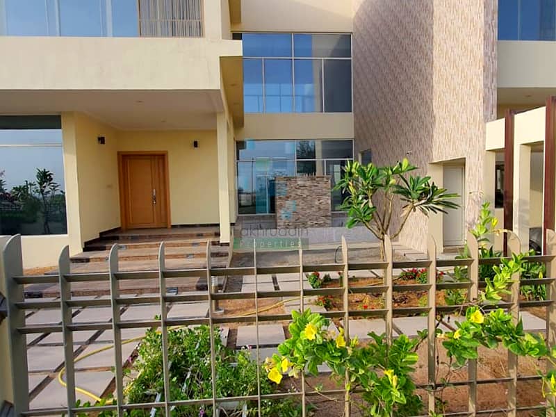 Fakhruddin Properties is proud to offer this Custom Build 6-bedroom villa in Fairway Vistas as follows