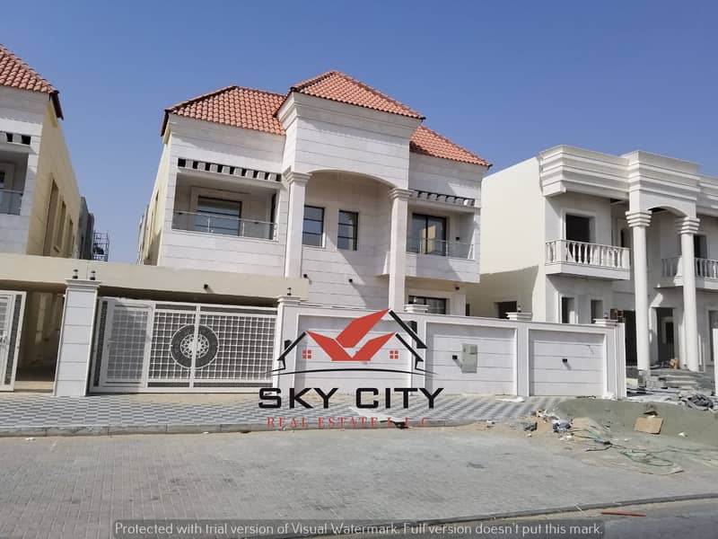 Stone villa for sale on the corner of two streets in front of a mosque, a privileged location, a full service area