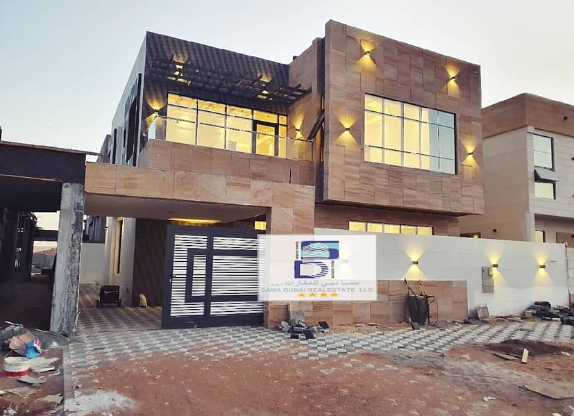 Villa for sale in Ajman, Jasmine area, two floors, super deluxe design, with the possibility of easy bank financing