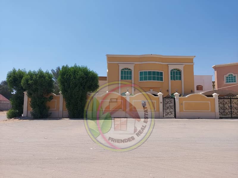 Villa for sale with personal finishing with electricity and water in Al Mowaihat 2 at an excellent price on two streets near all services, hypermarkets and shopping centers