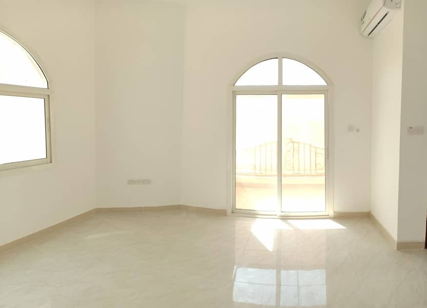 Four wonderful spacious rooms and a spacious hall for rent in Shakhbout City