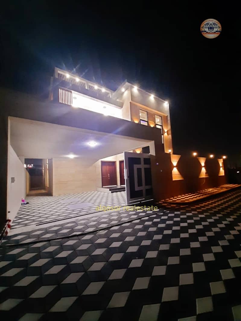 Villa for sale in Ajman, Jasmine area, two floors, facing a stone, on a street directly next to a mosque, with the possibility of easy bank financing