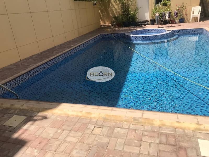 Very nice 5 bedroom plus maid villa with shared pool and gym for rent in Umm Suqeim 1